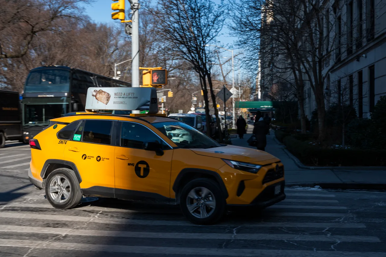 Sephora advertisement on a static taxi top display in New York City