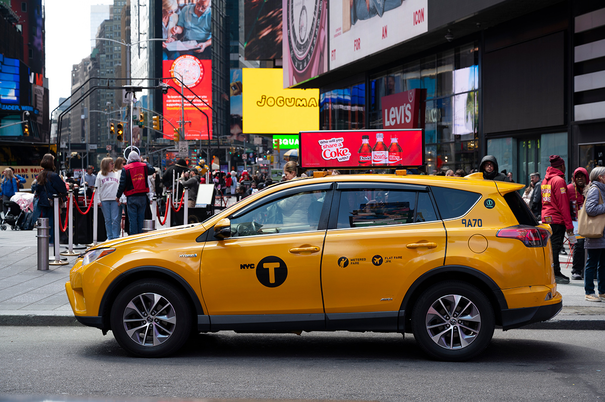 NYC yellow taxi with digital LED advertising